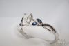 Picture of .53ct J VS Oval Diamond Ring w/ Marquee Sapphire Accents 18k 