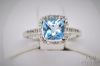 Picture of 10k 1.28ct Blue Topaz Statement Ring w/ Diamond Melee 